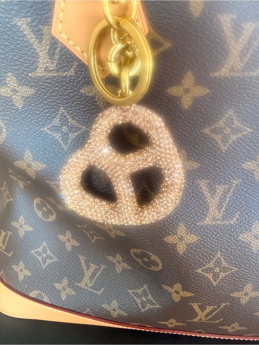 Crystal pretzel bag charm with brass